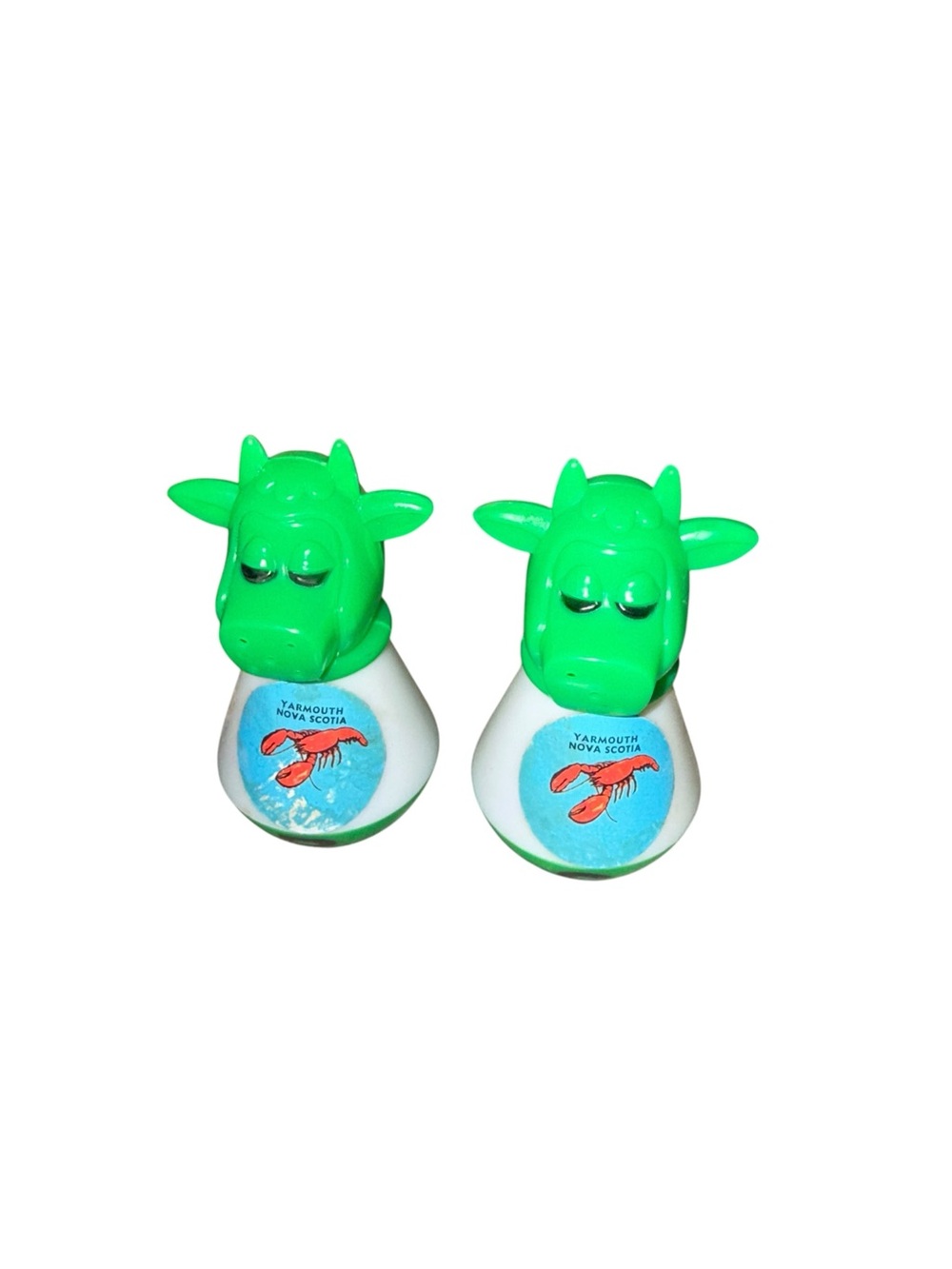 Vintage plastic green white bull shakers